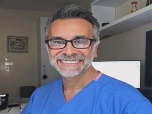 UroCare Specialist's expert urologist Dr. Tommy Higgan performing acupuncture therapy.