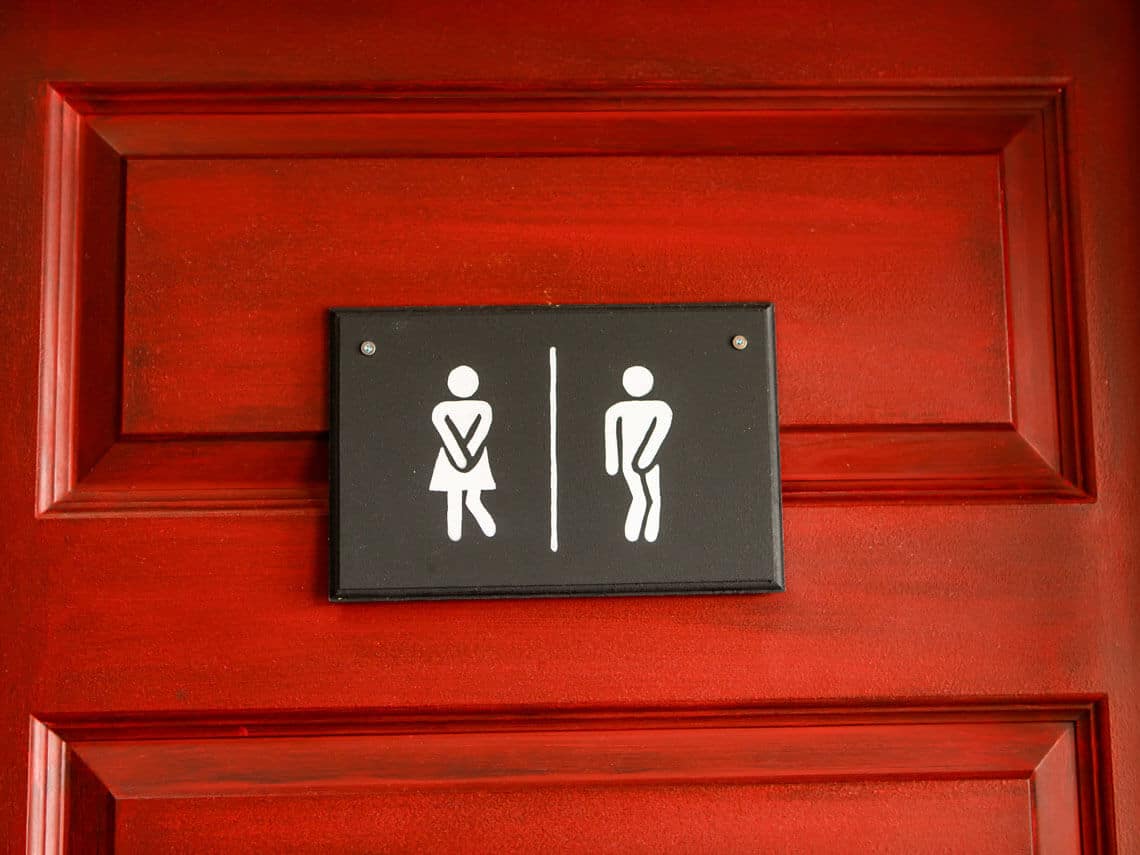 Bathroom signs showing stick figures who can't urinate